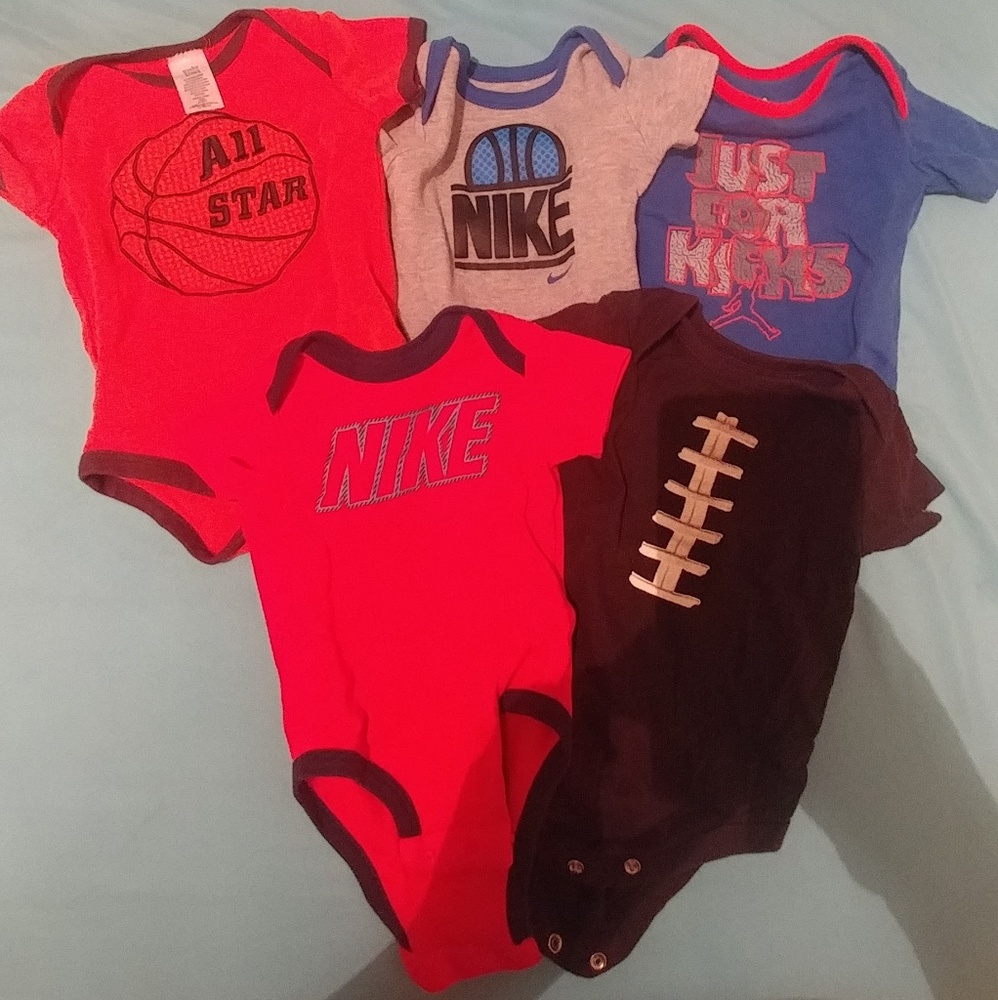 Baby boy sports onsies.